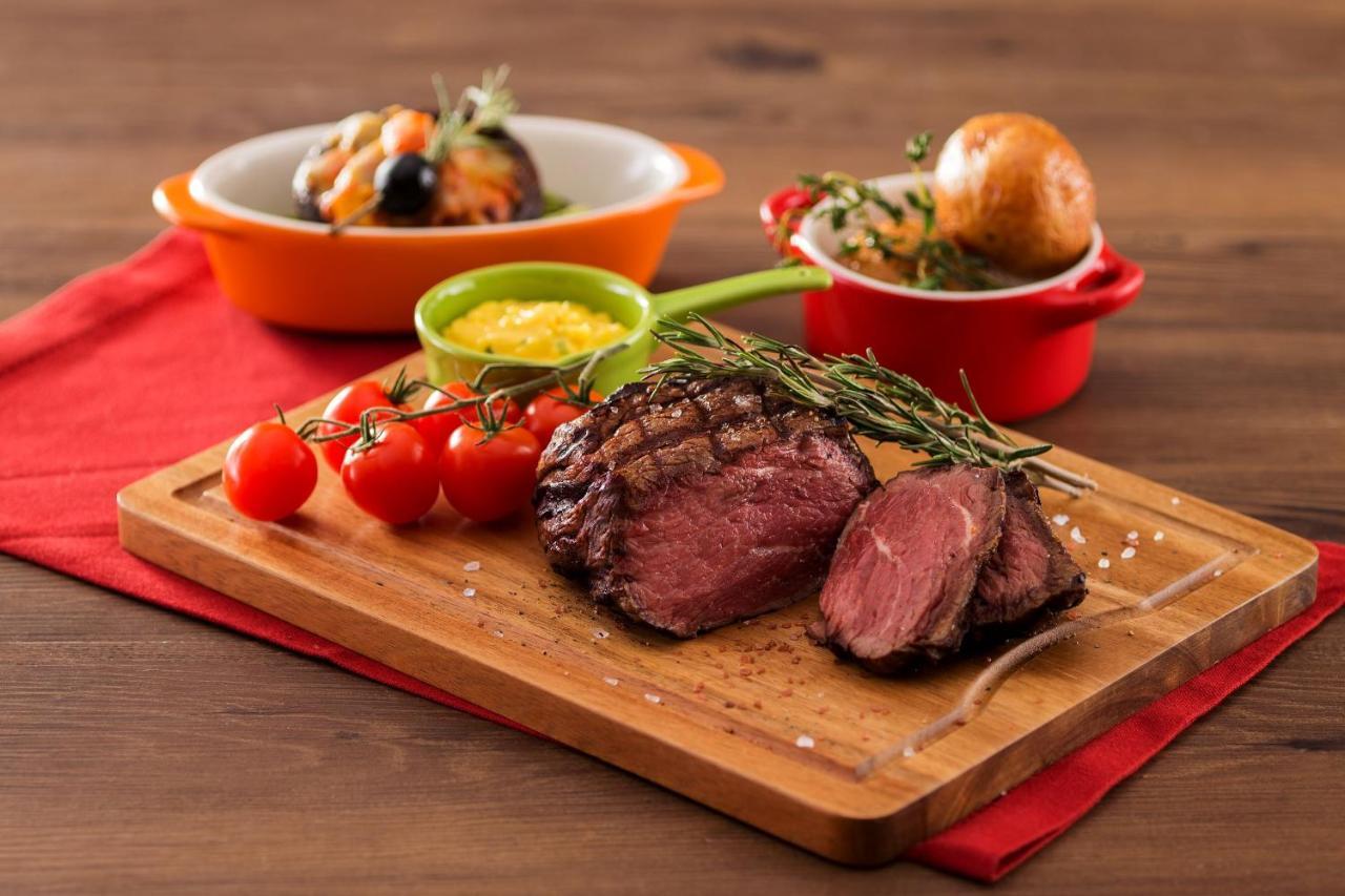 Hong Kong Gold Coast Hotel Экстерьер фото A steak prepared with the dry-aging technique